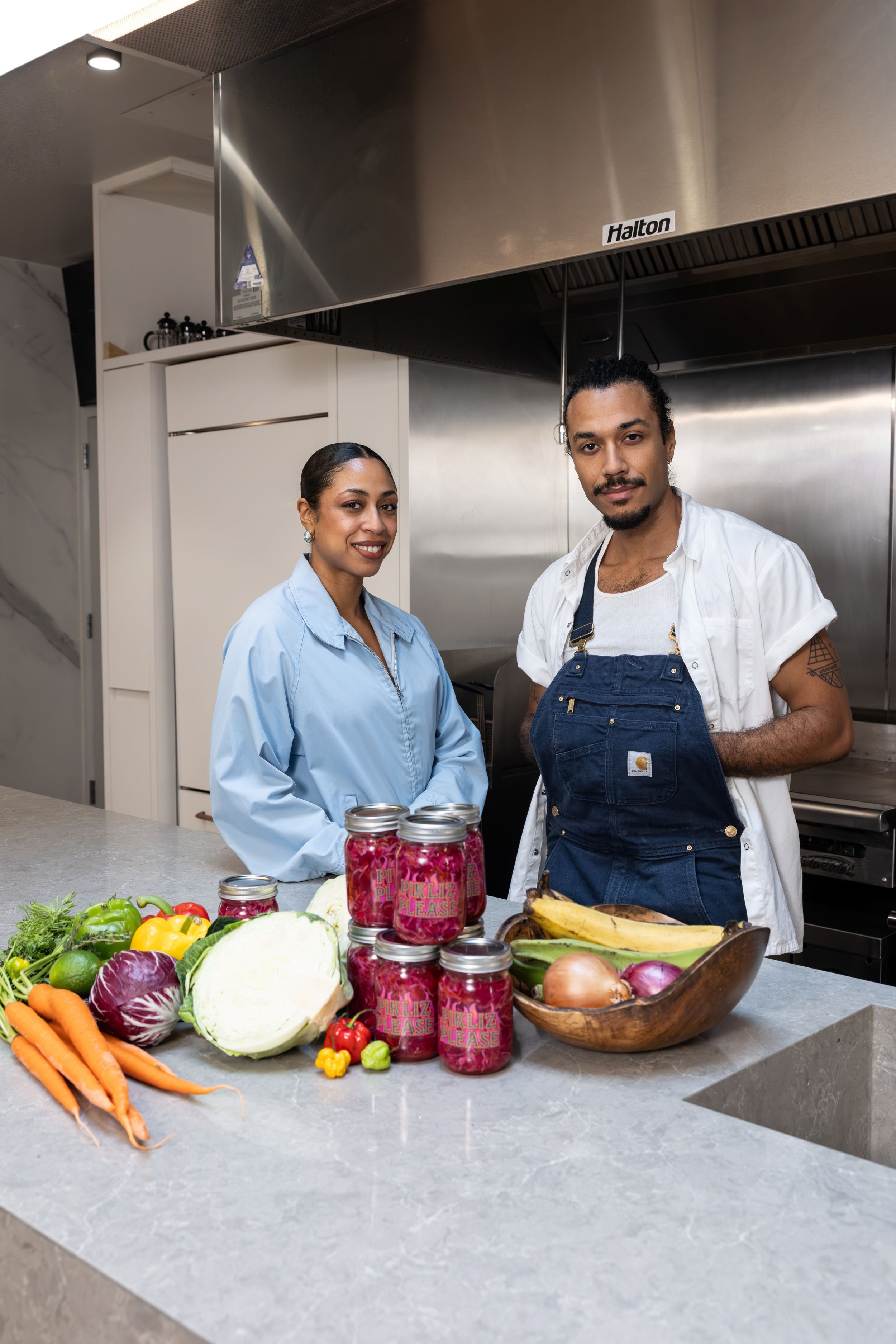 Woman and Man in kitchen trying food